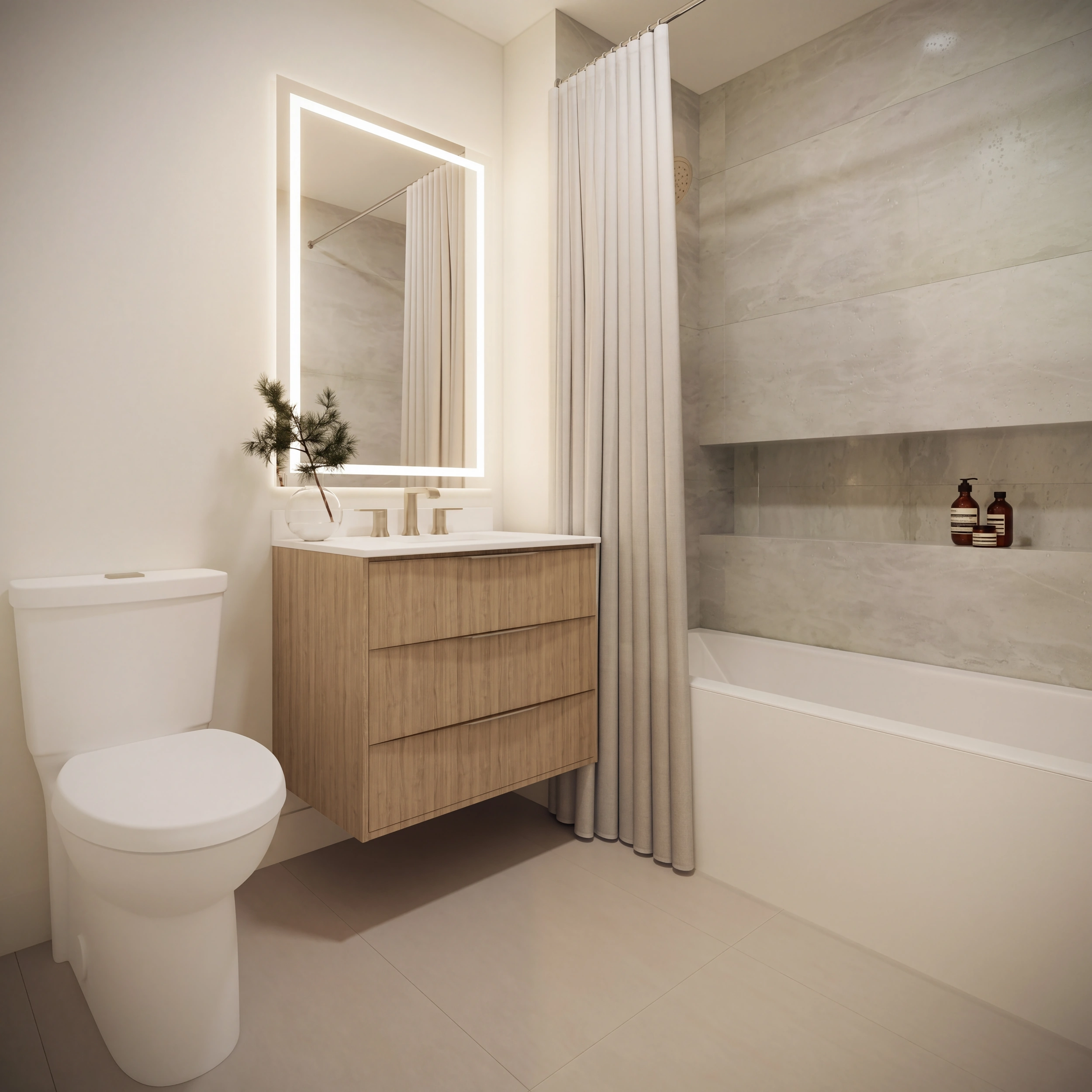 Modern bathroom with floating vanity, backlit mirror, and marble tub surround